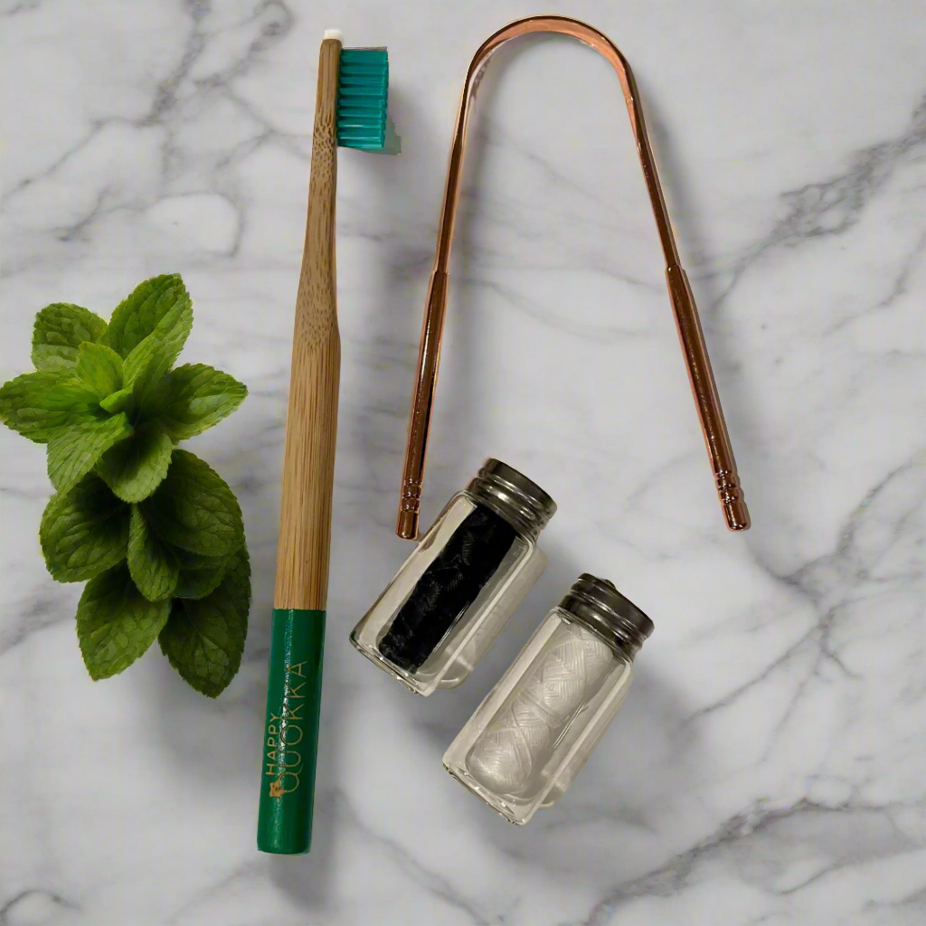 bundle for the teeth with bamboo toothbrush, tongue scraper and dental floss